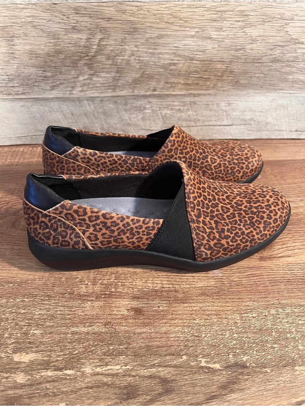 Clarks Cheetah Print Slip-On Flats in Brown and Black Kayleigh Step Loafers